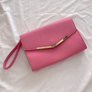 Pink clutch/wristlet with gold detailing